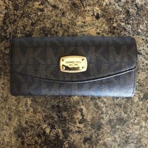 Authentic Michael Kors monogram wallet
